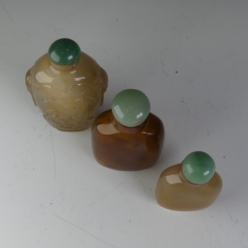 194 - An antique Chinese honey agate Snuff Bottle, well hollowed with jade stopper, H 7.5cm, together with... 