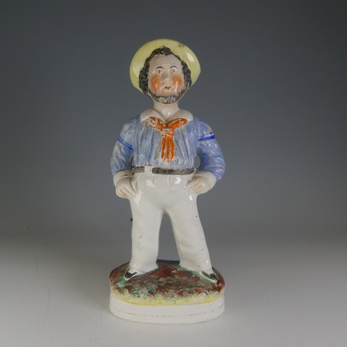 233 - A 19thC Staffordshire pottery figure of a Sailor, decorated in polychromes, raised on gilt line plin... 