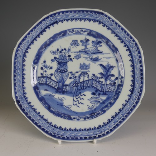 182 - A 19thC Chinese blue and white Plate, of octagonal form, decorated with a vase with flora, hairline ... 