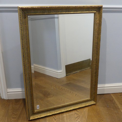 698 - A contemporary antique style giltwood framed rectangular wall Mirror, W 101 cm x H 75 cm.... 