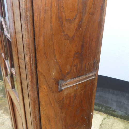 699 - A pair of oak early 20th century astral glazed hall Cabinets, missing central connecting shelves, W ... 