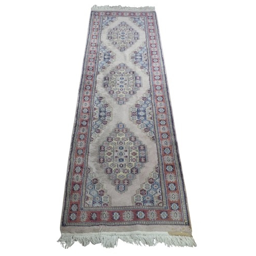 344 - Tribal Rugs; a hand-knotted Persian rug, cotton pile on cotton base, pale green ground, 152cm x 91cm... 