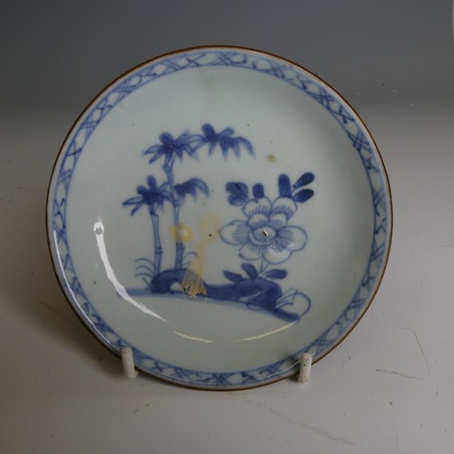 160 - A Chinese Nanking Cargo blue and white porcelain Saucer, of underglaze decoration, D 13cm, together ... 