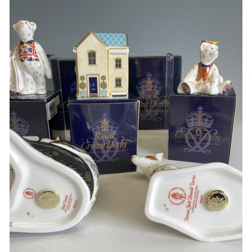 230 - A small quantity of Royal Crown Derby, to comprise three paperweights, Sweet Shop, Jack Russell and ... 