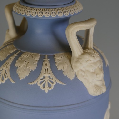 247 - A Wedgwood Jasperware twin-handled Urn, with 'Dancing Hours' decoration and Bacchus mask handles, do... 