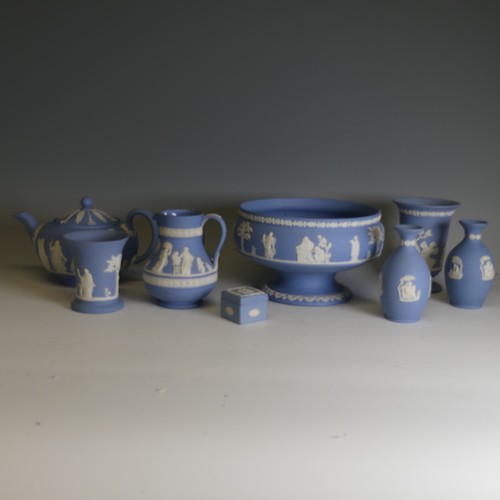 251 - A large quantity of Wedgwood blue Jasperware, including pedestal bowl, 20cm rim diameter, teapot, va... 