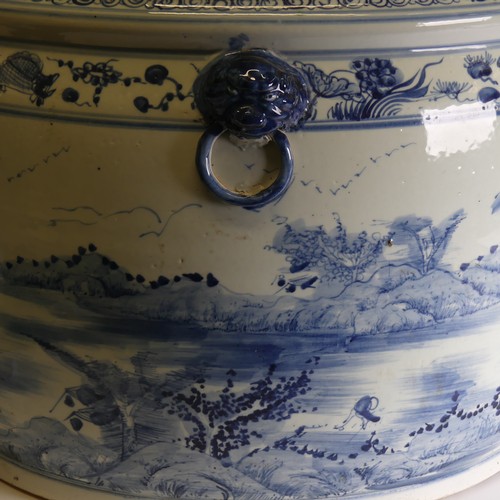 185 - A large 19thC Chinese blue and white porcelain Jardiniere, decorated in mountainous landscape, D 49c... 