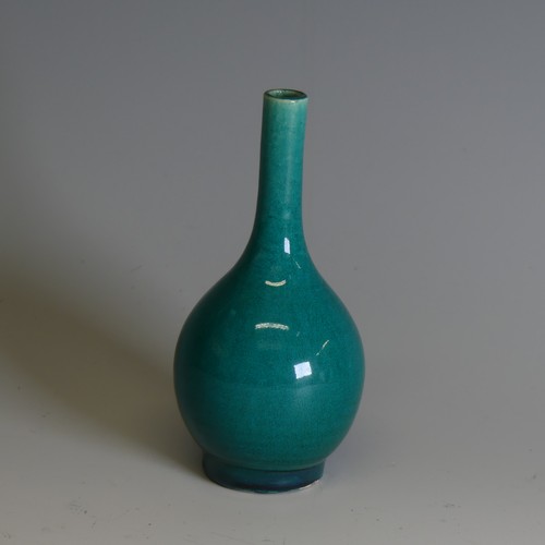 88 - An antique Chinese turqouise monochrome bottle Vase, with bulbous base and slender neck, H 12.5cm.Pr... 