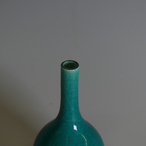 88 - An antique Chinese turqouise monochrome bottle Vase, with bulbous base and slender neck, H 12.5cm.Pr... 