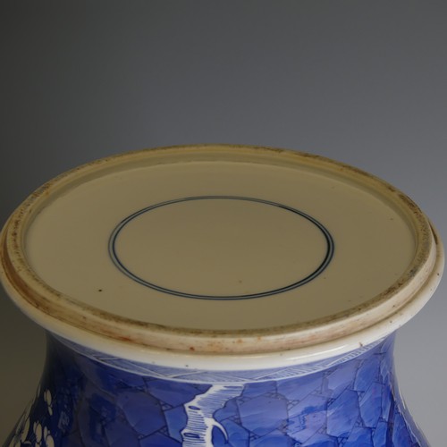 186 - A pair of early 20th century Chinese blue and white porcelain prunus Temple Jars, decorated in typic... 