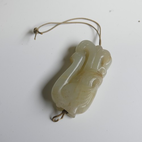 179 - A small quantity of Chinese Jade, to comprise a Tiger Jade recumbent Dog, 8cm x 5cm, together with a... 