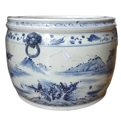 185 - A large 19thC Chinese blue and white porcelain Jardiniere, decorated in mountainous landscape, D 49c... 