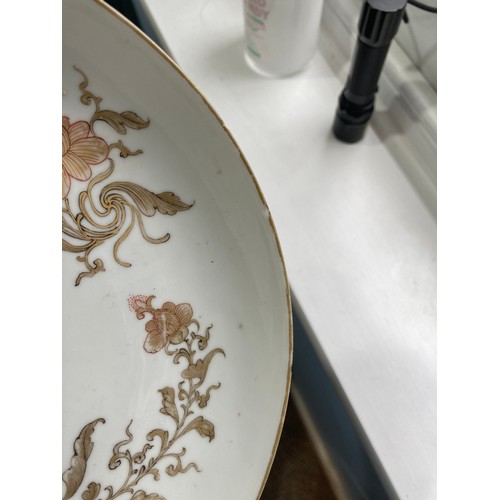 66 - An unusual 19thC Chinese export porcelain Plate, the plain ground with gilded foliate representation... 