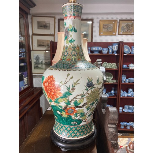 203 - A large Chinese porcelain Lamp, in the shape of a bottle vase depicting floral, H 66 cm, together wi... 