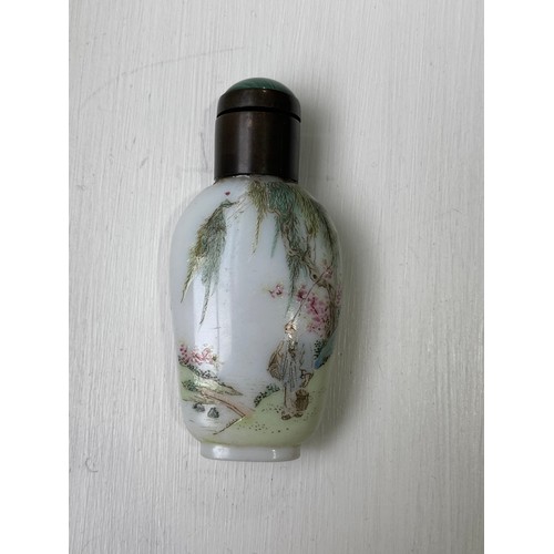 188 - A 19thC Chinese milk glass enamelled Snuff Bottle, enamelled with a fisherman with animals under a t... 