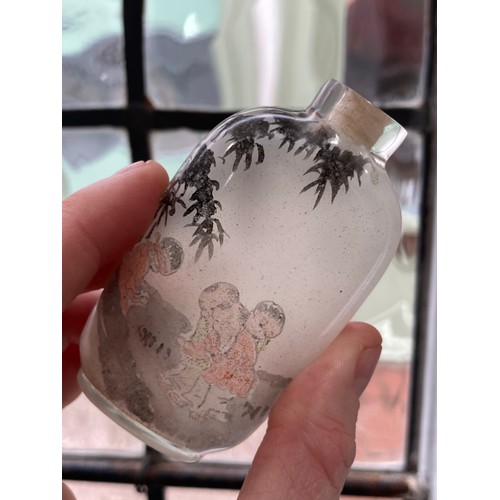 188 - A 19thC Chinese milk glass enamelled Snuff Bottle, enamelled with a fisherman with animals under a t... 