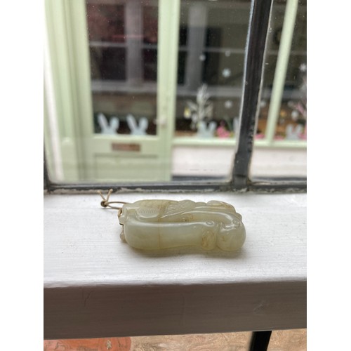 179 - A small quantity of Chinese Jade, to comprise a Tiger Jade recumbent Dog, 8cm x 5cm, together with a... 