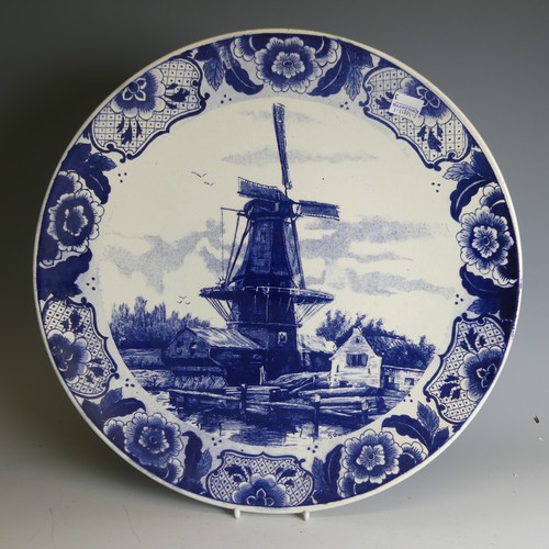 363 - A pair of De Porceleyne Fles Delft pottery Plates, of moulded form, decorated with birds amongst flo... 