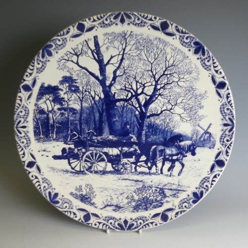 363 - A pair of De Porceleyne Fles Delft pottery Plates, of moulded form, decorated with birds amongst flo... 