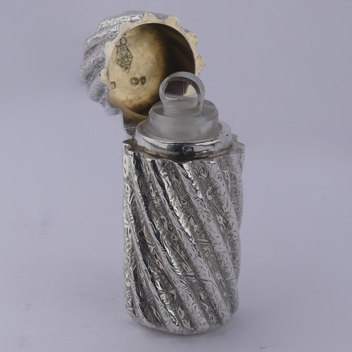 10 - Sampson Mordan; A Victorian silver Scent Bottle, hallmarked London 1882, with engraved swirl fl... 