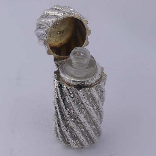 10 - Sampson Mordan; A Victorian silver Scent Bottle, hallmarked London 1882, with engraved swirl fl... 