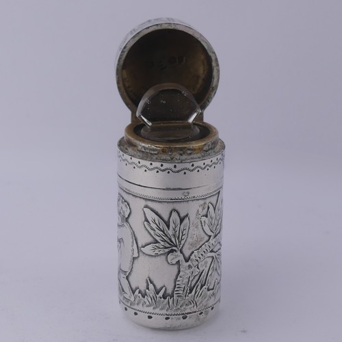 11 - Sampson Mordan; A Victorian silver Scent Bottle, hallmarked London 1881, decorated with a boy t... 