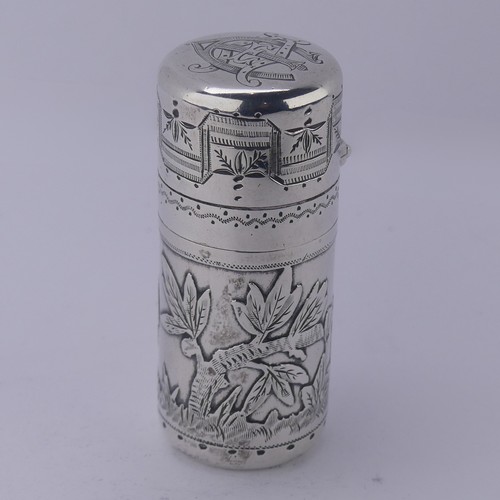 11 - Sampson Mordan; A Victorian silver Scent Bottle, hallmarked London 1881, decorated with a boy t... 