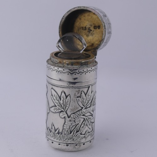 11 - Sampson Mordan; A Victorian silver Scent Bottle, hallmarked London 1881, decorated with a boy t... 