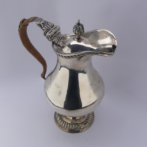 15 - An Edwardian silver Hot Water Jug, by Charles Stuart Harris, hallmarked London 1903, of baluster for... 