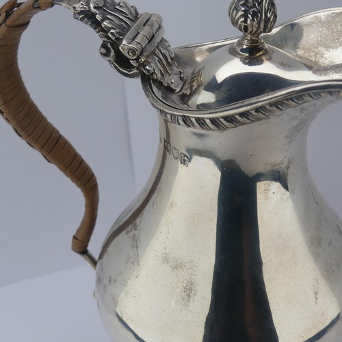 15 - An Edwardian silver Hot Water Jug, by Charles Stuart Harris, hallmarked London 1903, of baluster for... 