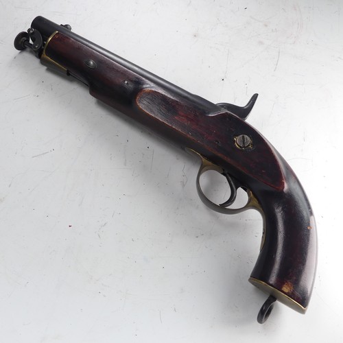 A 19th century 'Enfield' percussion cap service Pistol, with walnut stock, 8 inch steel barrel, steel inscribed lock plate 'Enfield 1858', brass butt, trigger guard and steel belt loop, articulating ramrod, no losses, cocks and fires, L 35 cm.