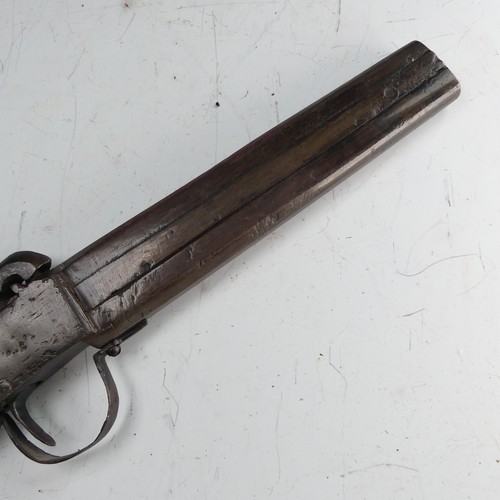 216 - A 19th century double barrelled over and under percussion Pistol, with 6 1/2 inch barrels with dual ... 