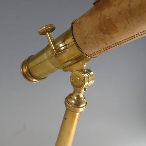 218 - A British Army issue three draw brass Telescope, by Broadhurst Clarkson & Co, with brown leather... 