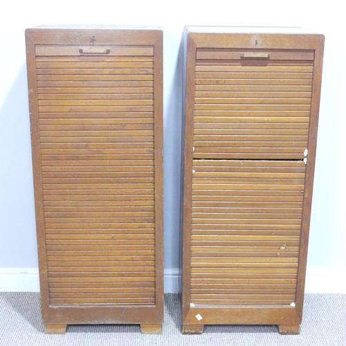 561 - A pair of mid 20th century oak tambour front music / filing Cabinets, tambour fronts concealing fitt... 