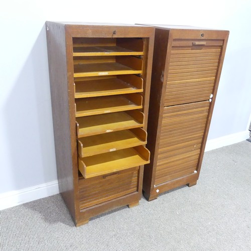 561 - A pair of mid 20th century oak tambour front music / filing Cabinets, tambour fronts concealing fitt... 