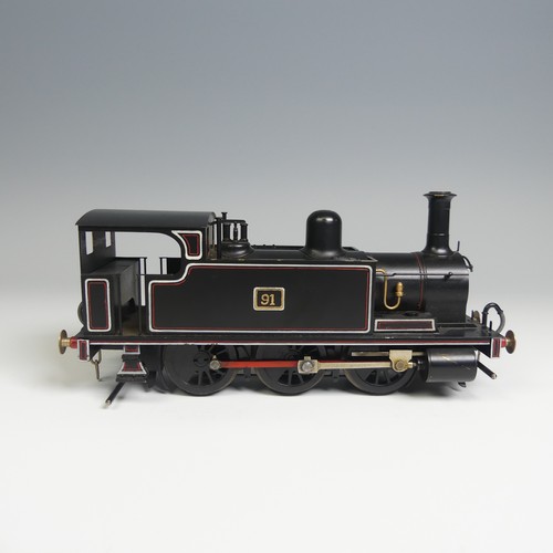 13 - An ‘0’ gauge electric 0-6-0 Tank Locomotive, finished in lined black as 91.