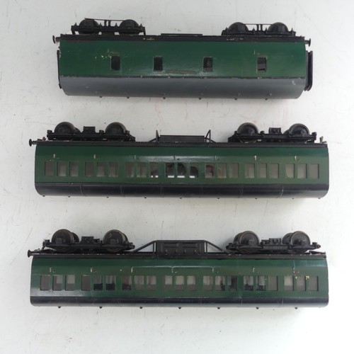 24 - Two Exley ‘0’ gauge SR Coaches, green with yellow lettering, repainted, together with two Exley '0' ... 