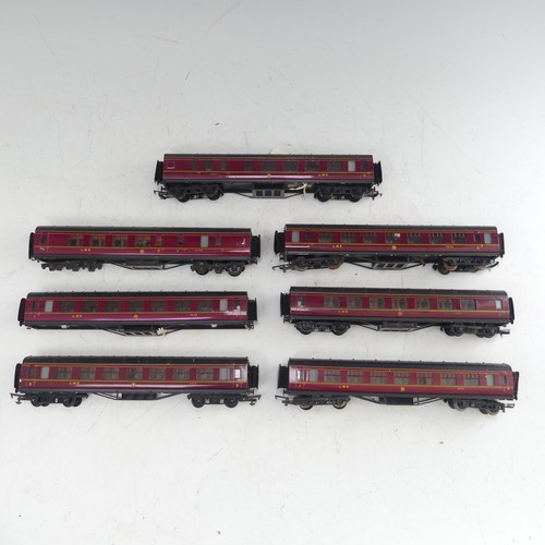 84 - Exley: seven Type K5 ‘00’ gauge L.M.S. Passenger Coaches, maroon, one coach lacks bogies (7)... 