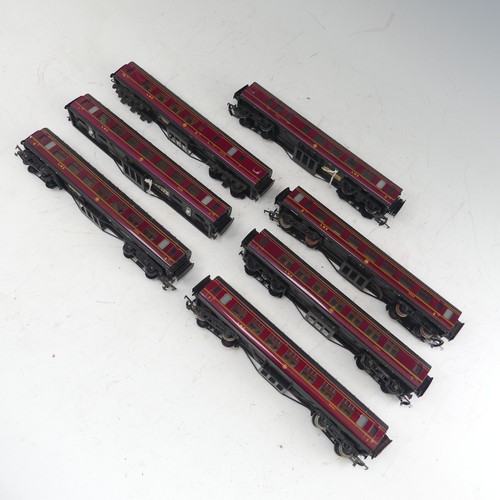 84 - Exley: seven Type K5 ‘00’ gauge L.M.S. Passenger Coaches, maroon, one coach lacks bogies (7)... 