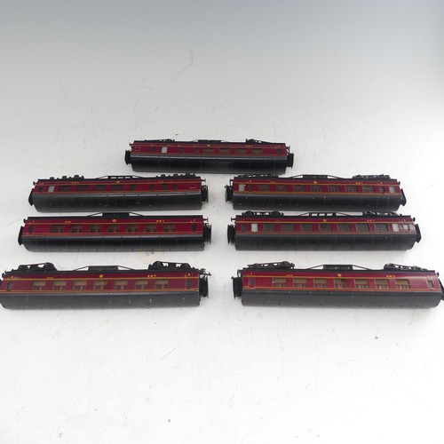 84 - Exley: seven Type K5 ‘00’ gauge L.M.S. Passenger Coaches, maroon, one coach lacks bogies (7)... 