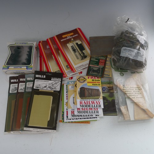 92 - A quantity of '00' gauge plastic and card track and trackside accessories and buildings kits, approx... 