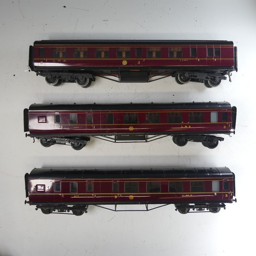 40 - Three Exley ‘0’ gauge LMS 3rd Class Corridor End Brake Coaches, maroon with yellow lettering, No.110... 