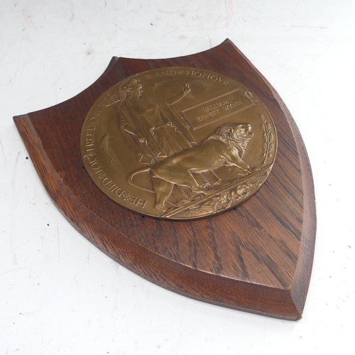 222 - A WW1 Devonshire memorial Plaque 'Death Penny', awarded to the family of 'William Ernest Wynn', moun... 