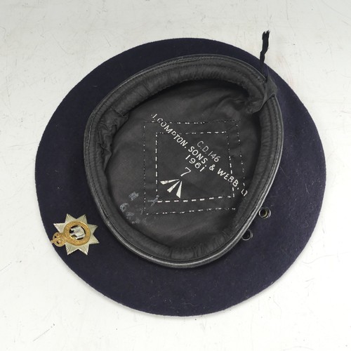 231 - A 1960’s Devonshire British Service Beret, fine navy wool cloth with leather trim, cloth lining havi... 