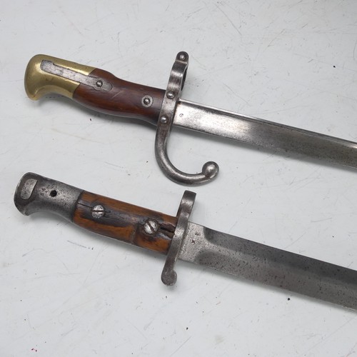 240 - A 19th century French Gras Bayonet, marked the the spine '1879' to the hilt '04893', total length 65... 