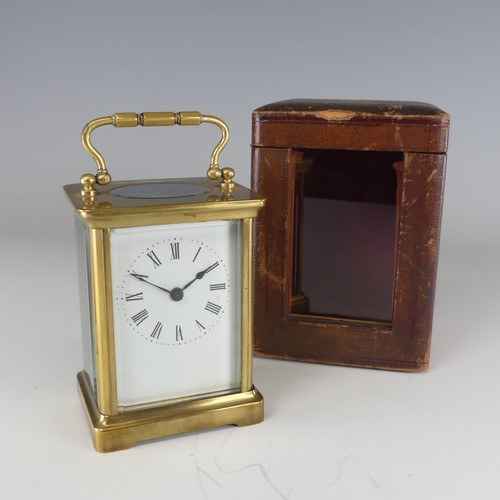 382 - An early 20th century carriage Clock, in fitted leather case, the white enamel dial with Roman numer... 