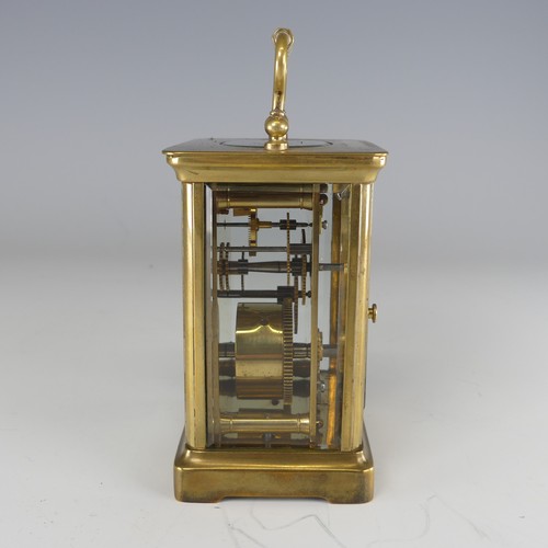 382 - An early 20th century carriage Clock, in fitted leather case, the white enamel dial with Roman numer... 