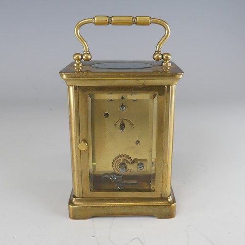 382 - An early 20th century carriage Clock, in fitted leather case, the white enamel dial with Roman numer... 