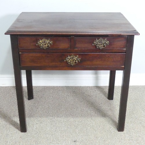 439 - A Georgian oak Lowboy, shaped top over three drawers and square canted legs, W 75.5 cm x H 71 cm x D... 