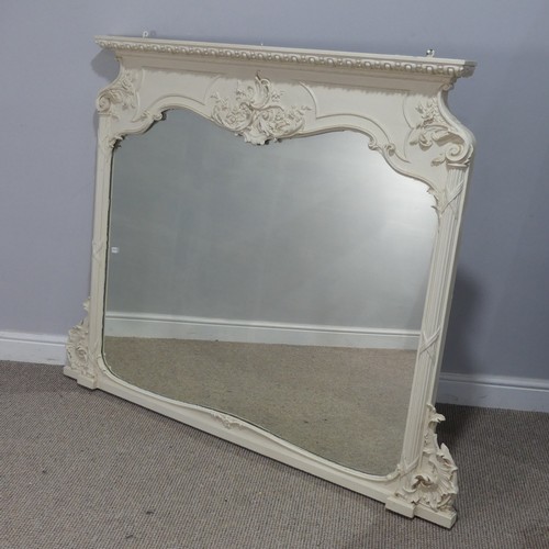 446 - A large antique style painted overmantle Mirror, with a moulded and carved pediment flanked by colum... 